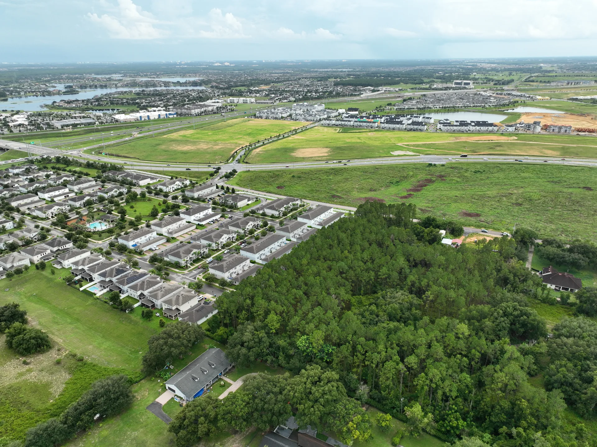 Wide aerial view of the Hamlin Town Center study area in Winter Garden, FL, showing the residential corridor, Highway 429, and the surrounding master-planned community that was captured for the photogrammetry project