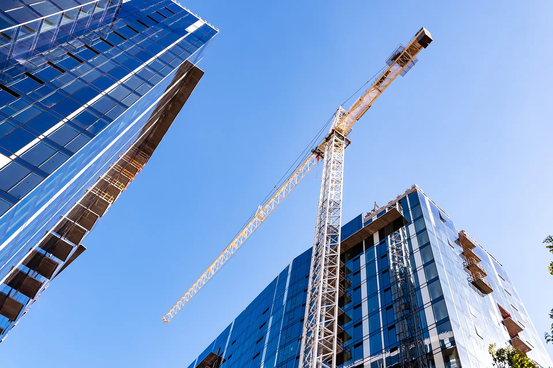 Aerial documentation of a modern Orlando construction site with crane and new building